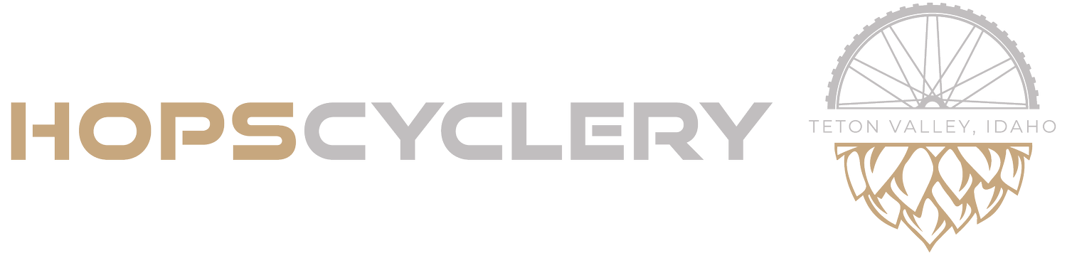 HOPS CYCLEERY logo with a stylized tree design.