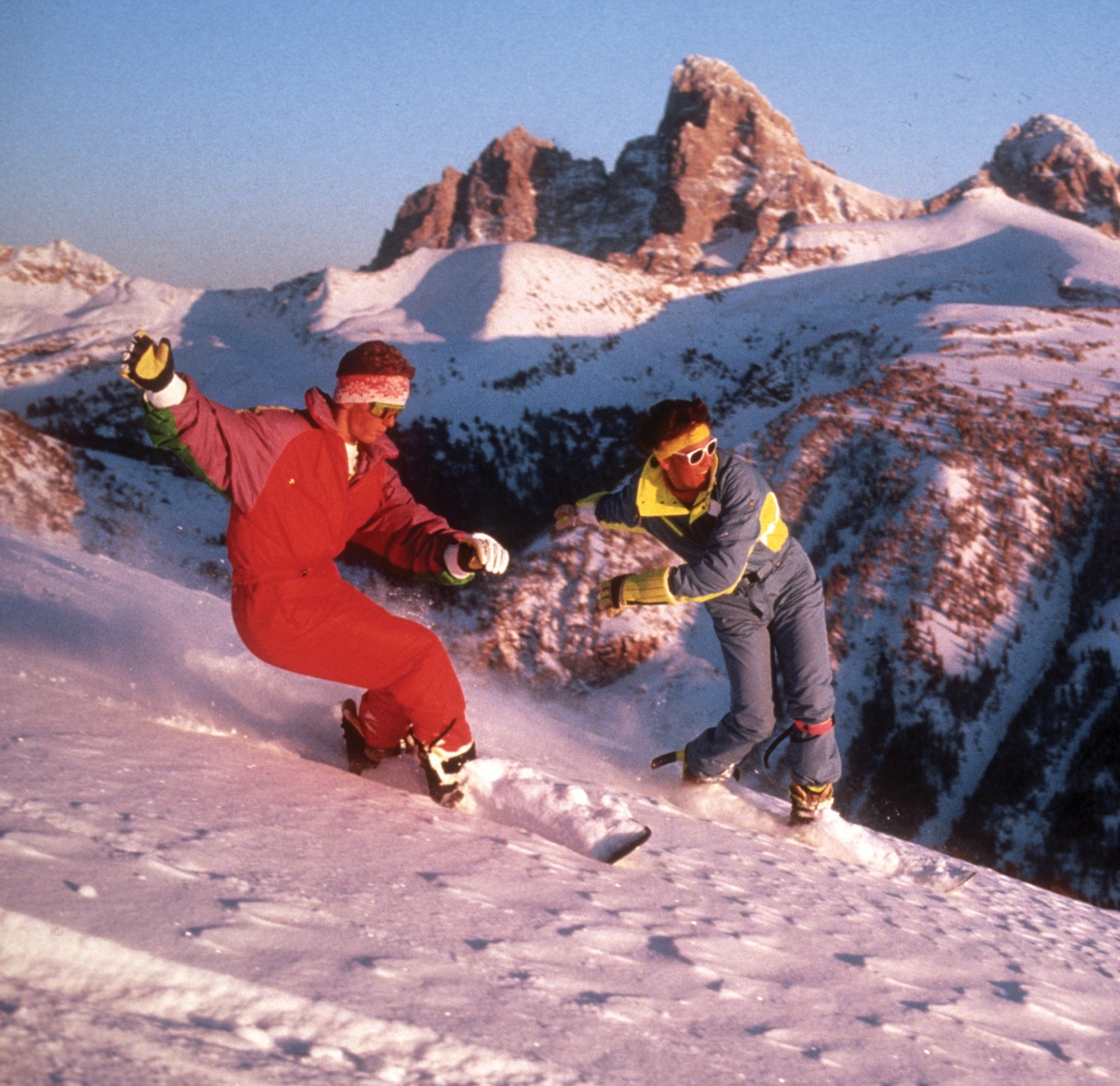 Two snowboarders from the 80s