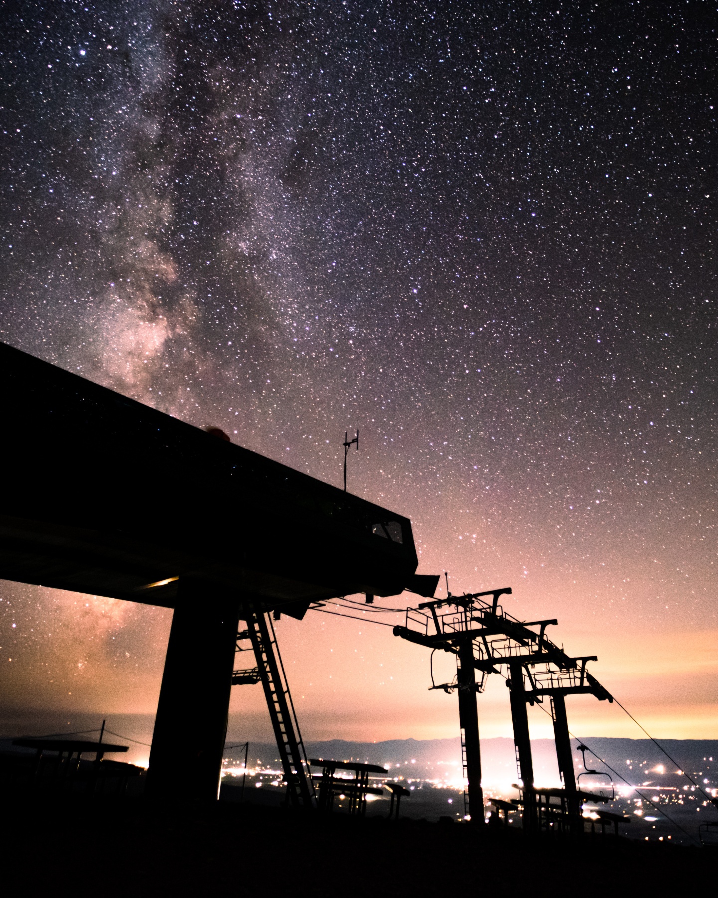 The Milky Way seen at night over a chair lift