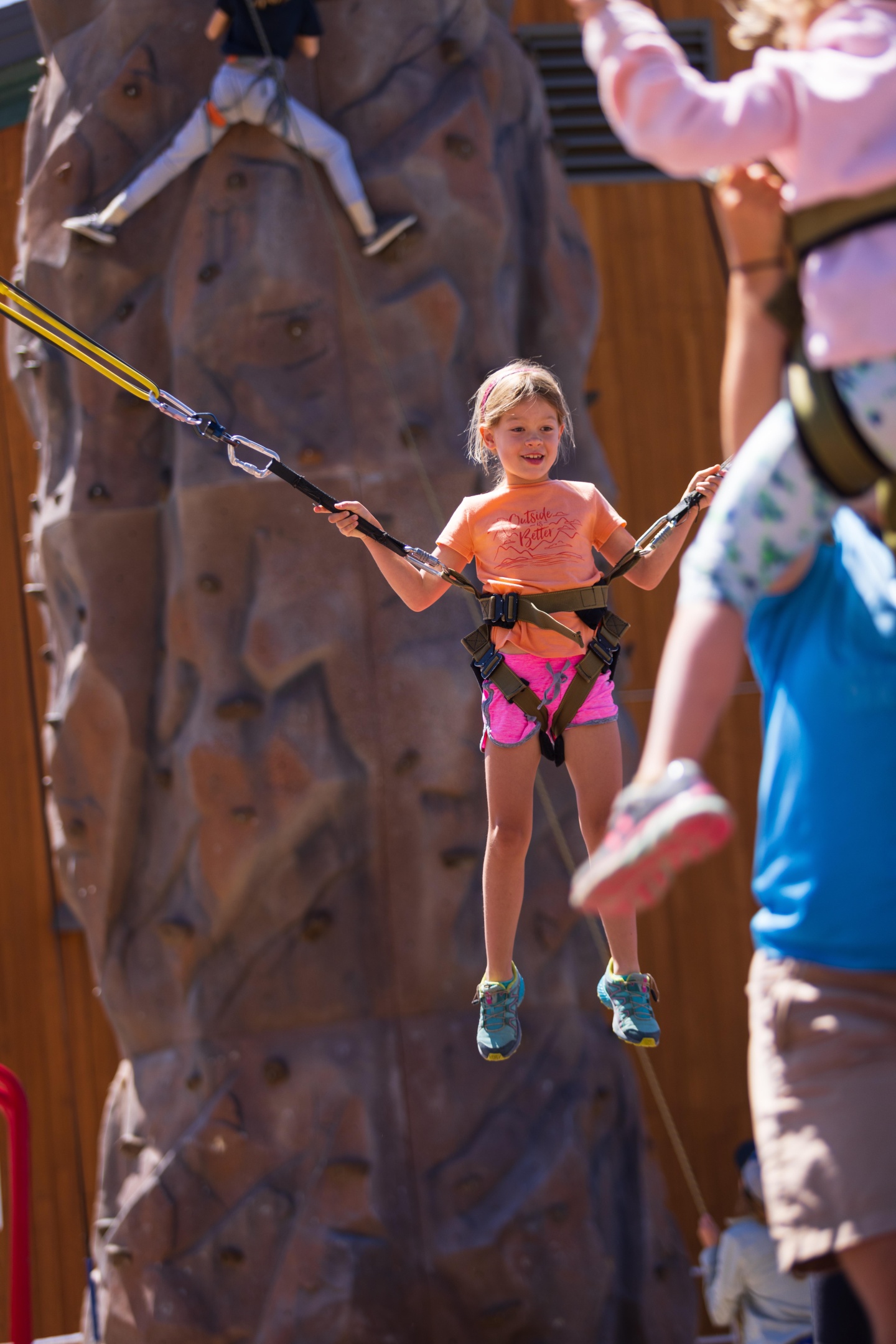 A child using a bungee trampoline