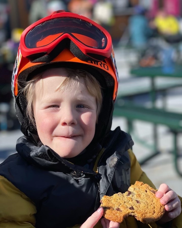 Child enjoys chocolate chip cookie