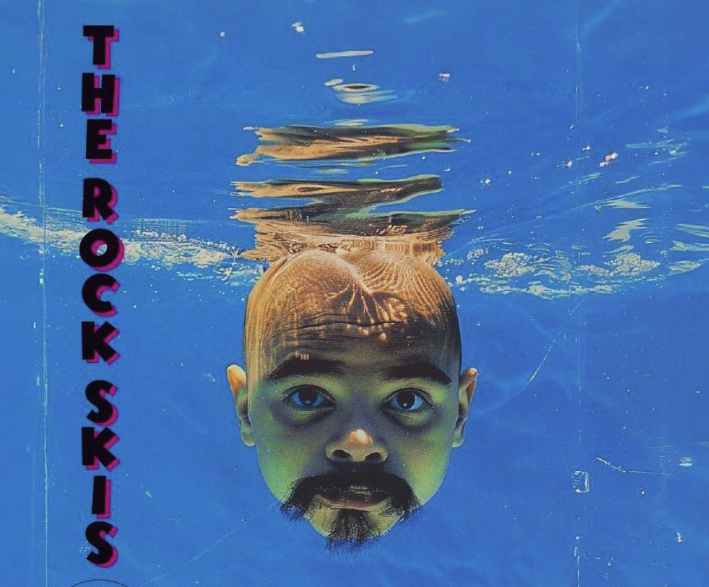 Head of a person partially submerged in water, viewed from below.